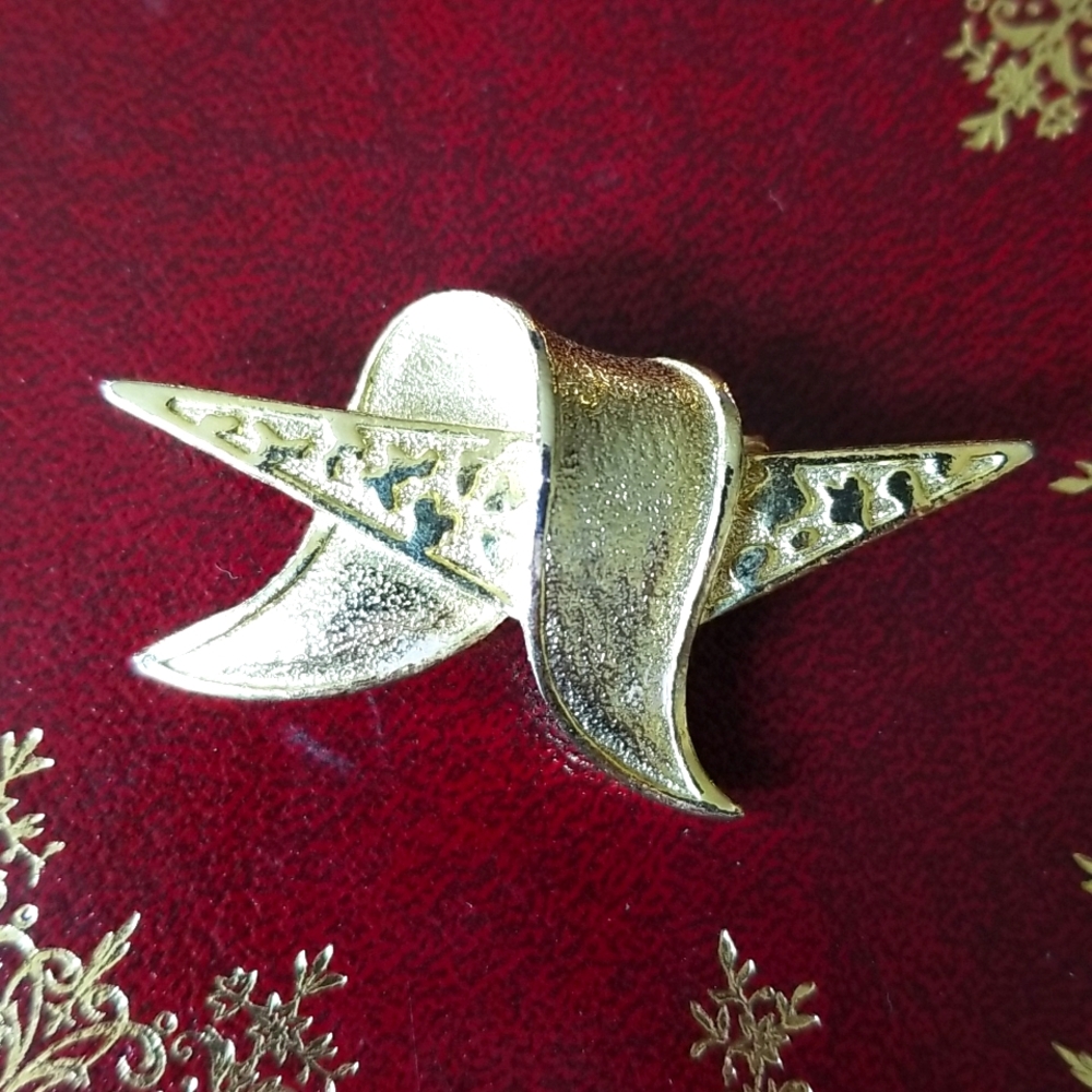 Gerry's vintage gold-tone ribboned atomic MCM brooch